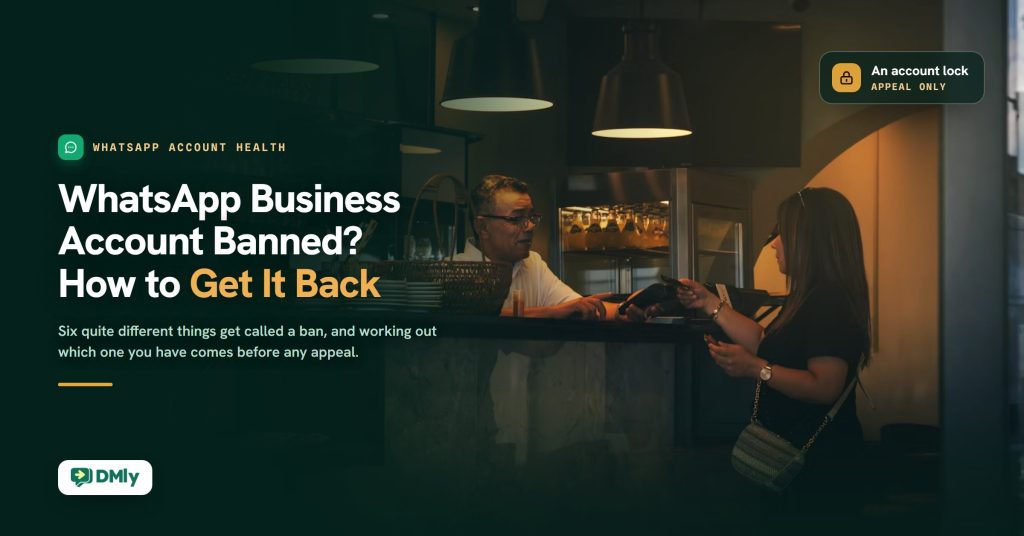 Inside a small cafe, the owner leaning across his counter to hold out a card terminal to the customer at the counter under the pendant lights, with the headline WhatsApp Business Account Banned? How to Get It Back set in white and amber over a dark green scrim on the left, a kicker reading WhatsApp account health, and a dark glass chip in the top right reading An account lock, appeal only.