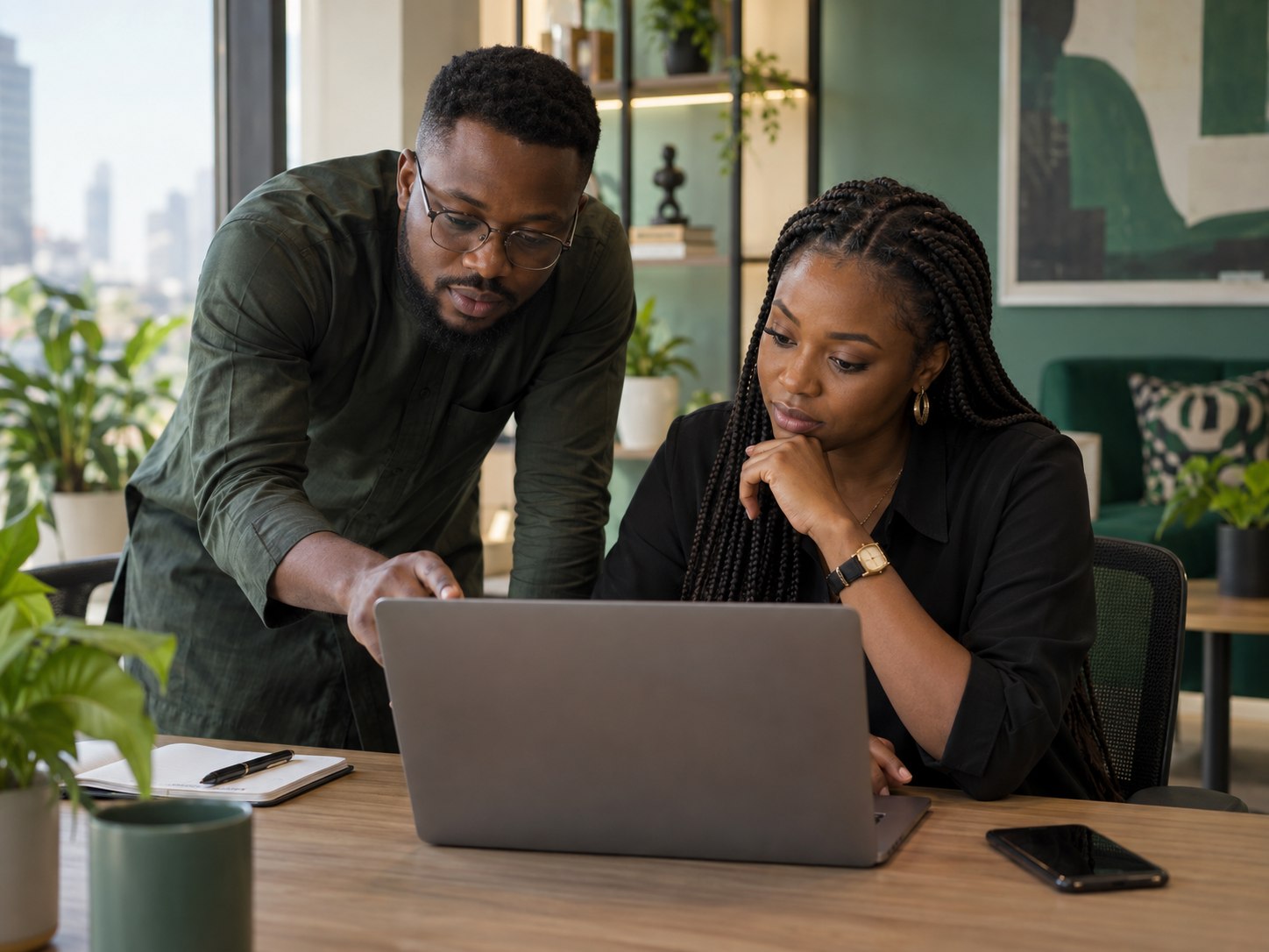 Nigerian support lead helping a teammate resolve a customer issue
